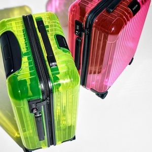 NWT neon green Rimowa suitcase